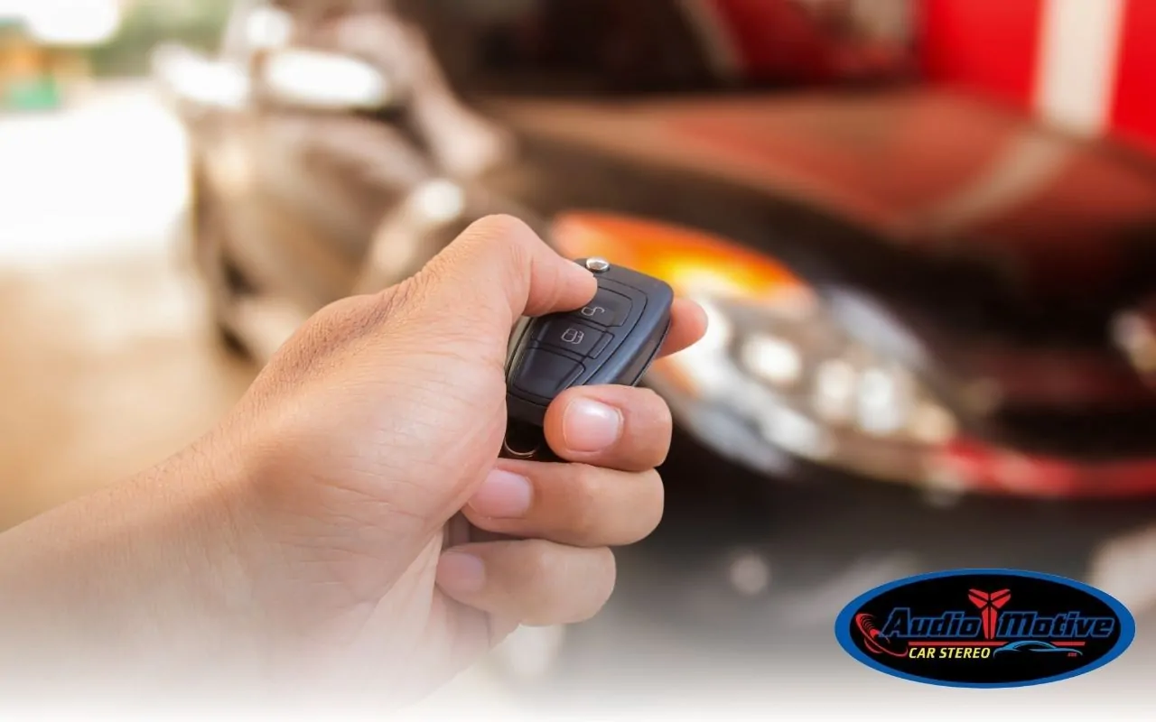 Customer learning how to use a professionally installed car alarm.