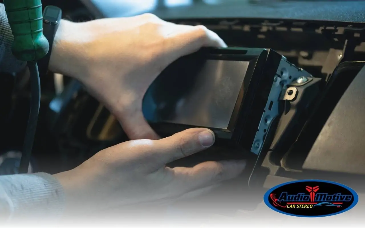 Audiomotive expert configuring DSP in a customer vehicle in San Leandro