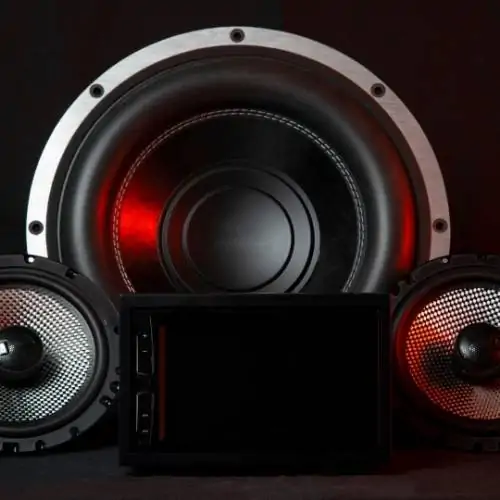 Fremont technician upgrading vehicle audio with stereo and amplifier